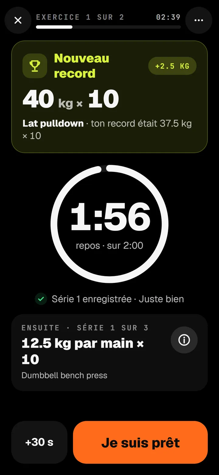 Le repos : un nouveau record au tirage vertical, 40 kg pour 10, un minuteur à 1:56 sur 2:00 et la série suivante.